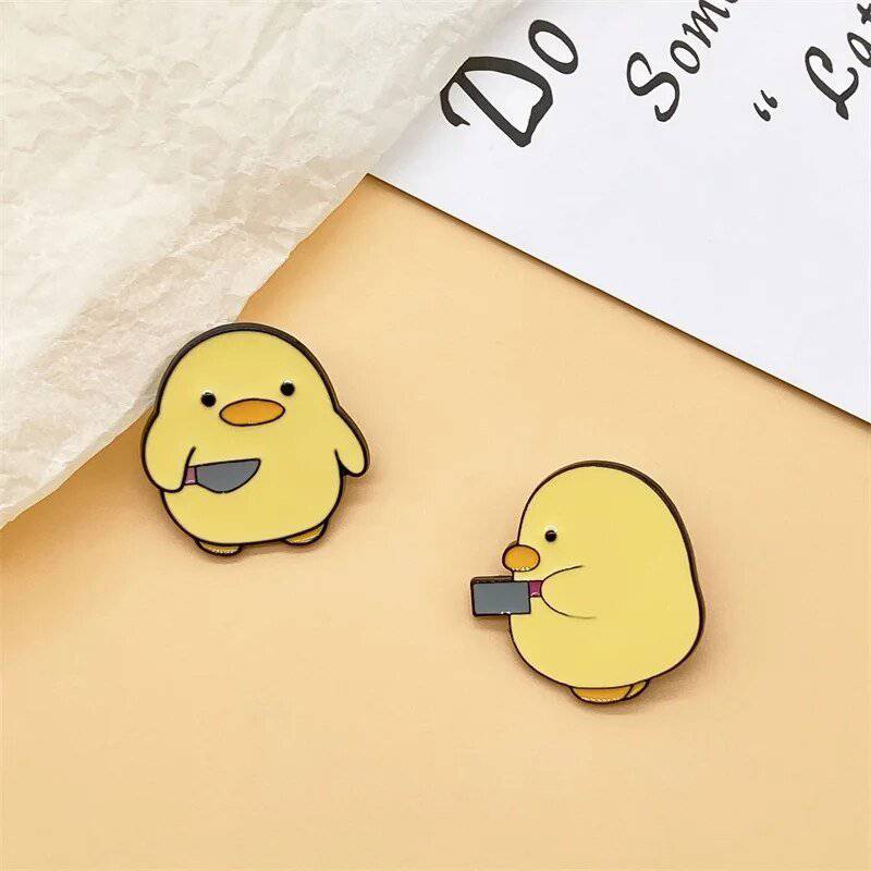 Fun Cartoon Yellow Duck Holding A Knife Enamel Lapel Pin - Creative Personality Gift for Friends - Niyo's Art Shop